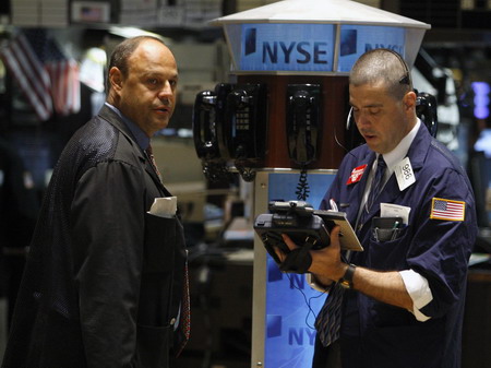 S&P tops 1,000 benchmark for 1st time in 9 months