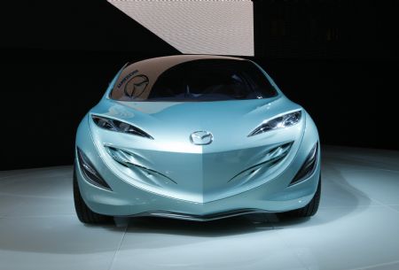 The Mazda Motor Corp Kiyora urban compact concept car is pictured at the 41st Tokyo Motor Show in Chiba, east of Tokyo October 21, 2009.[Xinhua/Reuters]